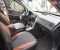 Черный Хендай Туксон, объемом двигателя 2 л и пробегом 240 тыс. км за 8200 $, фото 6 на Automoto.ua