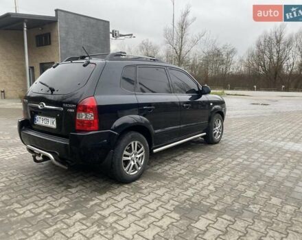 Чорний Хендай Туксон, об'ємом двигуна 1.99 л та пробігом 345 тис. км за 7600 $, фото 3 на Automoto.ua