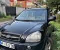 Чорний Хендай Туксон, об'ємом двигуна 2 л та пробігом 330 тис. км за 3700 $, фото 1 на Automoto.ua