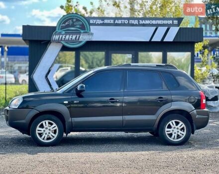 Черный Хендай Туксон, объемом двигателя 2 л и пробегом 227 тыс. км за 8200 $, фото 2 на Automoto.ua