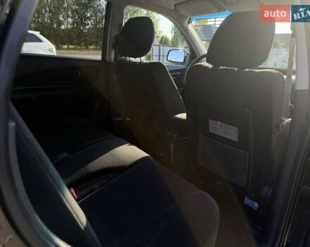 Черный Хендай Туксон, объемом двигателя 2 л и пробегом 270 тыс. км за 8200 $, фото 9 на Automoto.ua