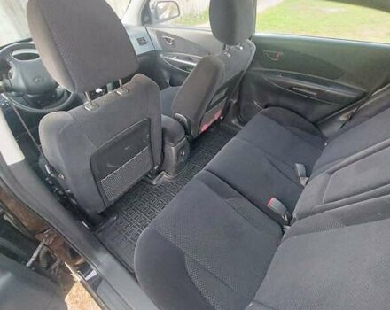 Черный Хендай Туксон, объемом двигателя 1.98 л и пробегом 200 тыс. км за 7100 $, фото 13 на Automoto.ua