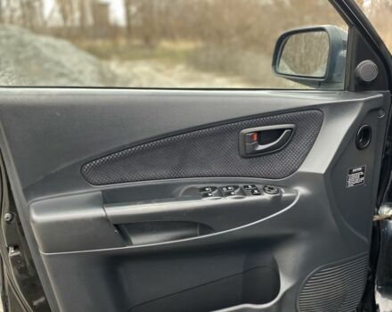 Черный Хендай Туксон, объемом двигателя 2 л и пробегом 330 тыс. км за 4350 $, фото 10 на Automoto.ua