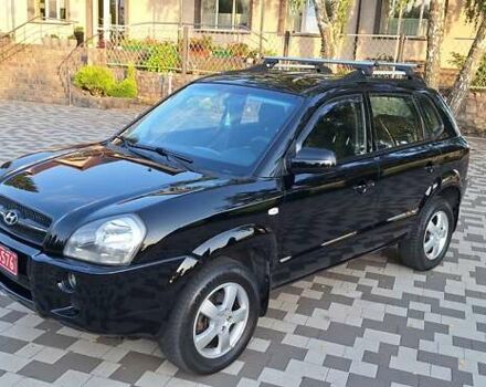 Черный Хендай Туксон, объемом двигателя 2 л и пробегом 190 тыс. км за 8150 $, фото 2 на Automoto.ua