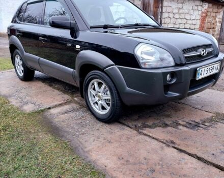 Черный Хендай Туксон, объемом двигателя 2 л и пробегом 272 тыс. км за 7500 $, фото 2 на Automoto.ua