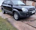 Черный Хендай Туксон, объемом двигателя 2 л и пробегом 272 тыс. км за 7500 $, фото 2 на Automoto.ua
