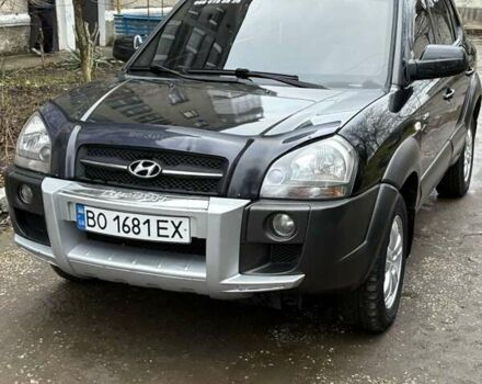 Черный Хендай Туксон, объемом двигателя 1.98 л и пробегом 273 тыс. км за 7400 $, фото 1 на Automoto.ua