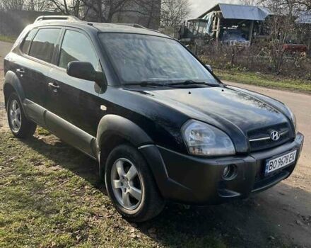 Черный Хендай Туксон, объемом двигателя 1.99 л и пробегом 302 тыс. км за 6900 $, фото 9 на Automoto.ua