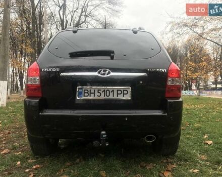 Черный Хендай Туксон, объемом двигателя 2 л и пробегом 210 тыс. км за 8999 $, фото 26 на Automoto.ua