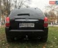 Черный Хендай Туксон, объемом двигателя 2 л и пробегом 210 тыс. км за 8999 $, фото 26 на Automoto.ua