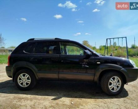 Чорний Хендай Туксон, об'ємом двигуна 2 л та пробігом 231 тис. км за 7700 $, фото 5 на Automoto.ua