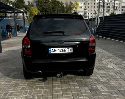 Чорний Хендай Туксон, об'ємом двигуна 2 л та пробігом 253 тис. км за 9428 $, фото 5 на Automoto.ua