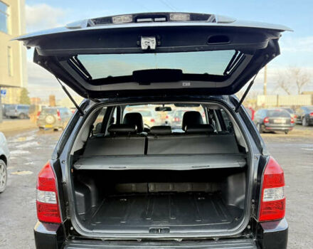 Черный Хендай Туксон, объемом двигателя 1.98 л и пробегом 230 тыс. км за 7750 $, фото 24 на Automoto.ua