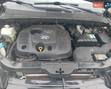 Черный Хендай Туксон, объемом двигателя 1.99 л и пробегом 235 тыс. км за 9000 $, фото 12 на Automoto.ua