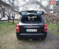 Черный Хендай Туксон, объемом двигателя 2 л и пробегом 240 тыс. км за 8200 $, фото 1 на Automoto.ua