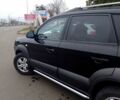 Черный Хендай Туксон, объемом двигателя 2 л и пробегом 196 тыс. км за 8950 $, фото 1 на Automoto.ua