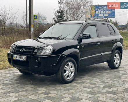 Черный Хендай Туксон, объемом двигателя 2 л и пробегом 180 тыс. км за 7700 $, фото 1 на Automoto.ua