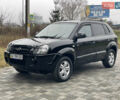 Черный Хендай Туксон, объемом двигателя 2 л и пробегом 180 тыс. км за 7700 $, фото 1 на Automoto.ua