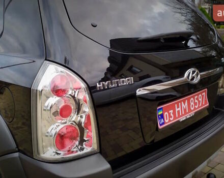 Чорний Хендай Туксон, об'ємом двигуна 2 л та пробігом 229 тис. км за 8600 $, фото 78 на Automoto.ua