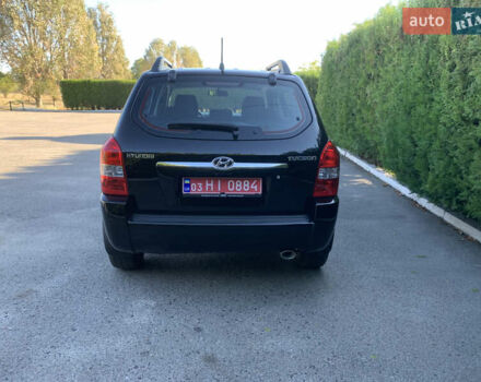Чорний Хендай Туксон, об'ємом двигуна 2 л та пробігом 56 тис. км за 9500 $, фото 2 на Automoto.ua