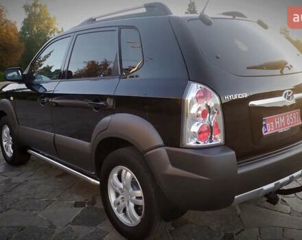 Черный Хендай Туксон, объемом двигателя 2 л и пробегом 230 тыс. км за 8600 $, фото 44 на Automoto.ua