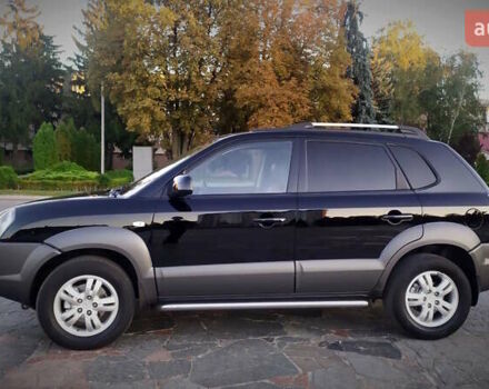 Черный Хендай Туксон, объемом двигателя 2 л и пробегом 230 тыс. км за 8600 $, фото 99 на Automoto.ua