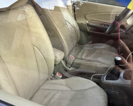 Чорний Хендай Туксон, об'ємом двигуна 2 л та пробігом 330 тис. км за 3700 $, фото 5 на Automoto.ua