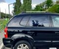 Черный Хендай Туксон, объемом двигателя 2 л и пробегом 175 тыс. км за 8900 $, фото 3 на Automoto.ua