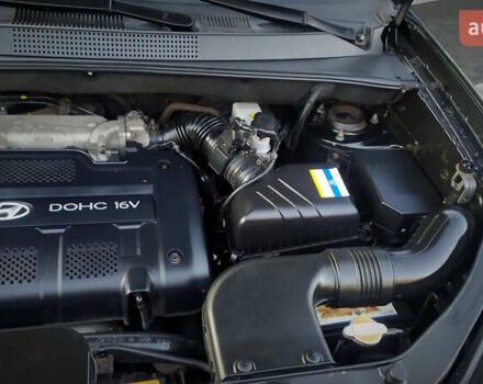 Черный Хендай Туксон, объемом двигателя 2 л и пробегом 230 тыс. км за 8600 $, фото 206 на Automoto.ua