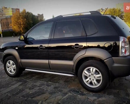 Черный Хендай Туксон, объемом двигателя 2 л и пробегом 230 тыс. км за 8600 $, фото 12 на Automoto.ua