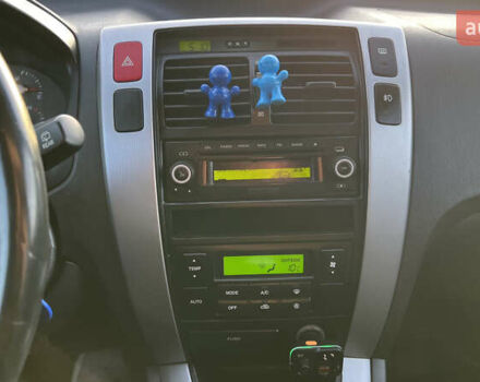 Черный Хендай Туксон, объемом двигателя 1.98 л и пробегом 243 тыс. км за 8500 $, фото 38 на Automoto.ua