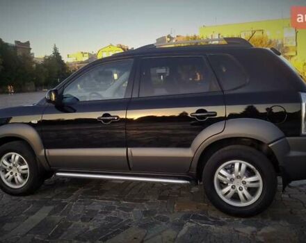 Черный Хендай Туксон, объемом двигателя 2 л и пробегом 230 тыс. км за 8600 $, фото 11 на Automoto.ua