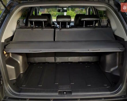 Черный Хендай Туксон, объемом двигателя 2 л и пробегом 230 тыс. км за 8600 $, фото 130 на Automoto.ua