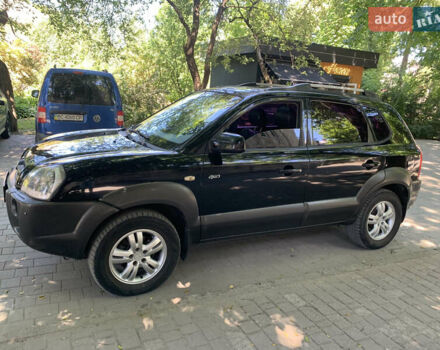 Черный Хендай Туксон, объемом двигателя 1.98 л и пробегом 232 тыс. км за 9100 $, фото 17 на Automoto.ua