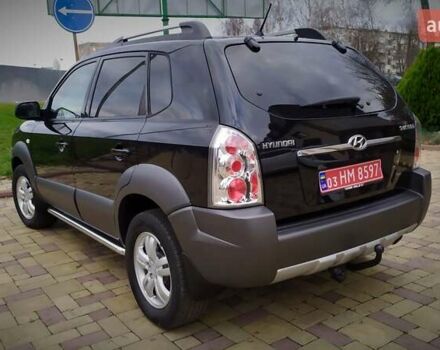Чорний Хендай Туксон, об'ємом двигуна 2 л та пробігом 229 тис. км за 8600 $, фото 47 на Automoto.ua