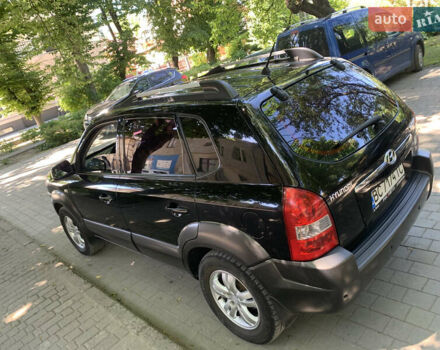 Черный Хендай Туксон, объемом двигателя 1.98 л и пробегом 232 тыс. км за 9100 $, фото 9 на Automoto.ua