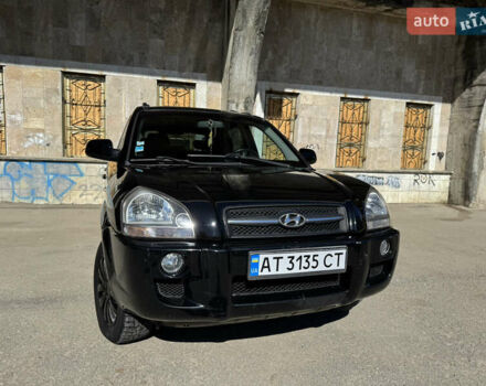 Черный Хендай Туксон, объемом двигателя 2 л и пробегом 189 тыс. км за 8250 $, фото 12 на Automoto.ua