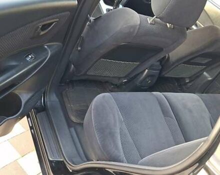 Черный Хендай Туксон, объемом двигателя 2 л и пробегом 190 тыс. км за 8150 $, фото 24 на Automoto.ua