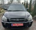 Черный Хендай Туксон, объемом двигателя 2 л и пробегом 218 тыс. км за 7600 $, фото 1 на Automoto.ua