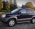 Черный Хендай Туксон, объемом двигателя 2 л и пробегом 230 тыс. км за 8600 $, фото 3 на Automoto.ua