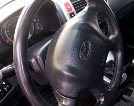 Черный Хендай Туксон, объемом двигателя 2 л и пробегом 236 тыс. км за 8300 $, фото 8 на Automoto.ua