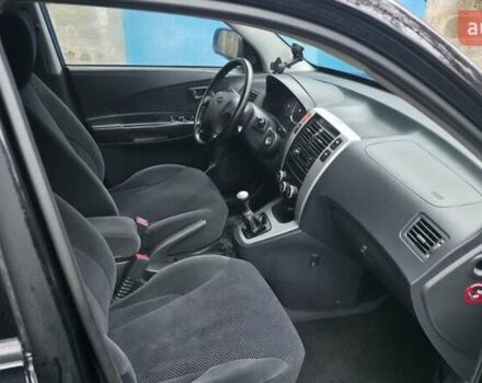 Чорний Хендай Туксон, об'ємом двигуна 2 л та пробігом 207 тис. км за 8200 $, фото 15 на Automoto.ua