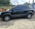 Черный Хендай Туксон, объемом двигателя 2 л и пробегом 270 тыс. км за 6000 $, фото 2 на Automoto.ua