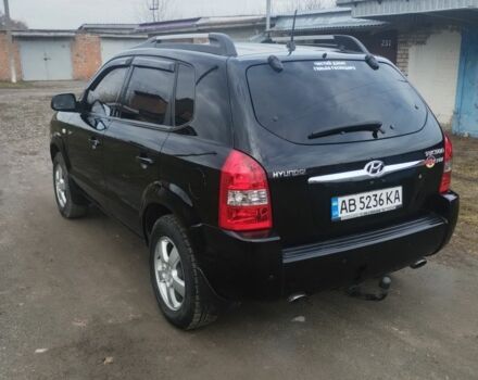 Чорний Хендай Туксон, об'ємом двигуна 2 л та пробігом 246 тис. км за 8100 $, фото 4 на Automoto.ua
