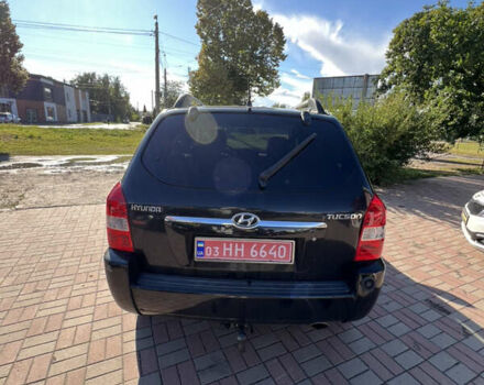 Чорний Хендай Туксон, об'ємом двигуна 2 л та пробігом 229 тис. км за 8400 $, фото 9 на Automoto.ua