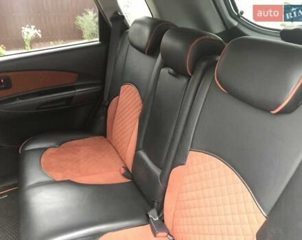 Черный Хендай Туксон, объемом двигателя 2 л и пробегом 210 тыс. км за 8999 $, фото 45 на Automoto.ua