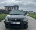 Черный Хендай Туксон, объемом двигателя 2 л и пробегом 270 тыс. км за 7000 $, фото 1 на Automoto.ua