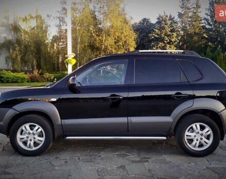 Черный Хендай Туксон, объемом двигателя 2 л и пробегом 230 тыс. км за 8600 $, фото 5 на Automoto.ua