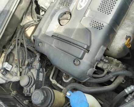 Черный Хендай Туксон, объемом двигателя 2 л и пробегом 270 тыс. км за 7500 $, фото 7 на Automoto.ua