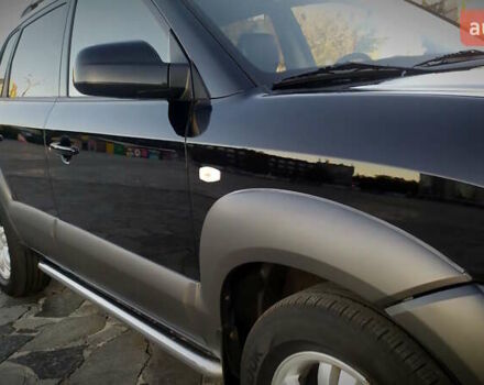 Черный Хендай Туксон, объемом двигателя 2 л и пробегом 230 тыс. км за 8600 $, фото 58 на Automoto.ua